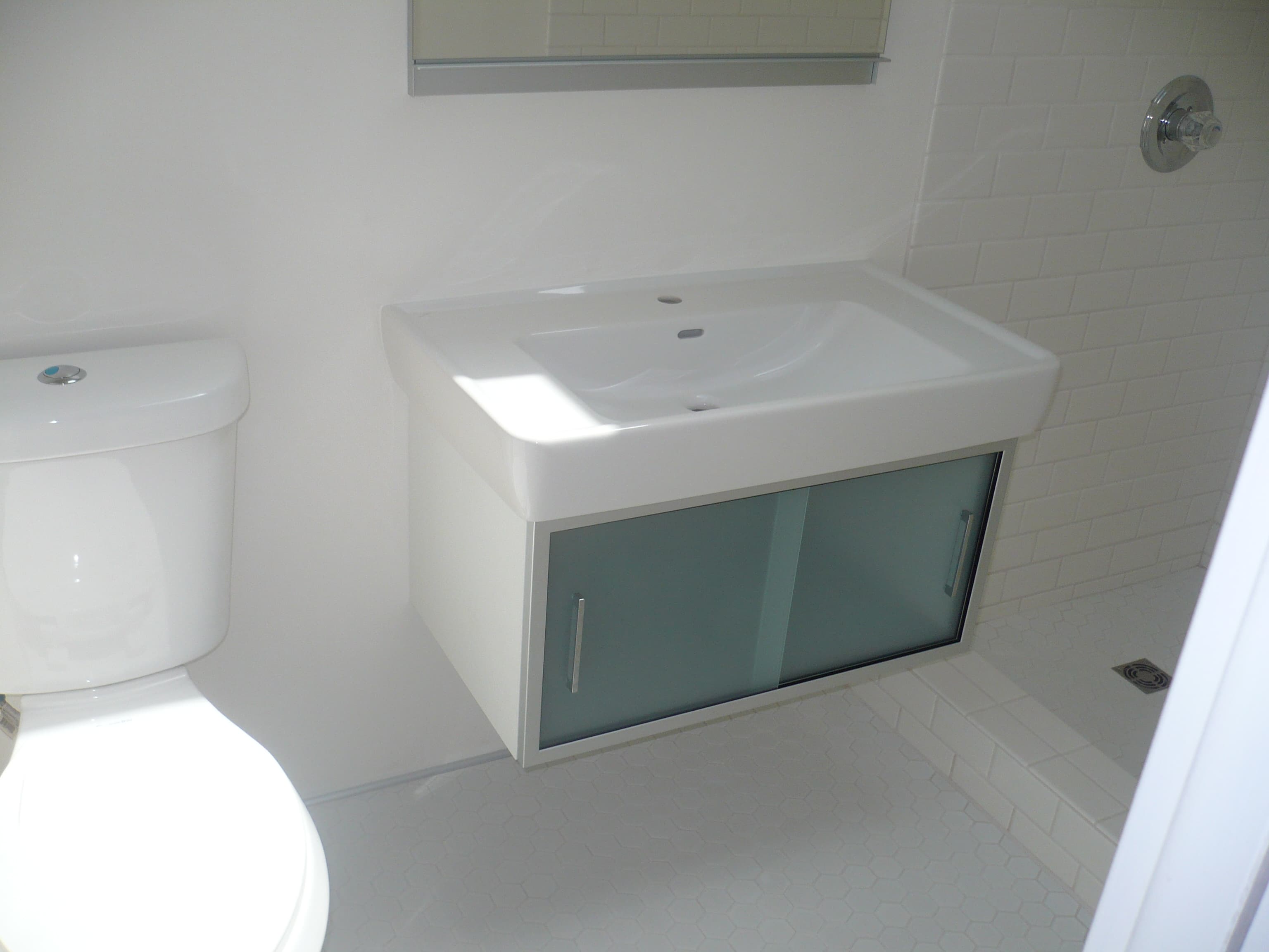 Modern Vanity & Hex Tile Floor in Carlsbad